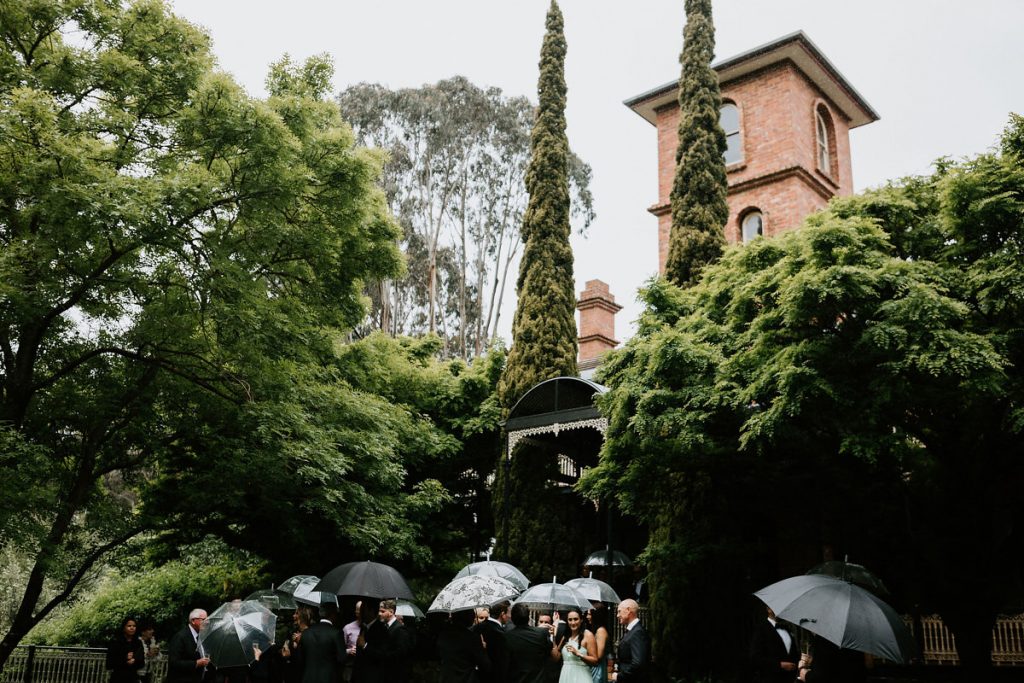Willow And Stone Estate Wedding Guests Walking To Ceremony Near Heritage Building
